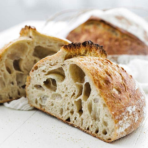 sourdough bread on white table cloth
